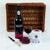 RUBY PORT AND JAR OF STILTON CHEESE IN WICKER TRAY
